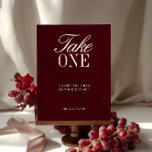 Elegant Burgundy Take One Wedding Favour Sign<br><div class="desc">Guide your guests with style using this elegant burgundy “Take One” wedding favour sign. Designed with a deep wine-red background and refined serif paired with script typography, it’s the perfect addition to your favour or gift table. This sign invites guests to take a bag or favour on their way out,...</div>