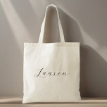Elegant Calligraphy Bridesmaid Name Tote Bag<br><div class="desc">Add a touch of timeless grace to your wedding day with the Elegant Calligraphy Bridesmaid Tote. This design features a sophisticated, flowing script that captures the romance of a traditional black-tie wedding. Perfect as a thank you gift for your bridal party or a refined way to carry hair and makeup...</div>