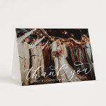 Elegant Calligraphy Custom Wedding Photo Thank You Card<br><div class="desc">Folded horizontal wedding thank you cards feature an elegant and stylish white calligraphy script text overlay design. Personalize the front with a favourite photo of the bride and groom, as well as a simple sans serif monogram of the couple's names. The back includes a second photo and a custom thank...</div>