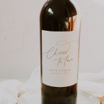 Elegant Charm Ivory and Gold Wedding Wine Labels<br><div class="desc">These elegant charm ivory and gold wedding wine labels are perfect for a simple wedding reception. The modern minimalist design features timeless vintage cream and gold romantic calligraphy with bohemian fairytale style. Personalize your wine bottle label stickers with your names and wedding date. These labels can be used for the...</div>