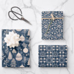 Elegant Christmas Mandala Pattern Vintage Ornament Wrapping Paper Sheet<br><div class="desc">Gift wrap set with three designs that share the same colour scheme, with a style vintage with navy blue and beige: the first is a traditional Christmas tree decoration with the phrase Merry Christmas in white, the second is a penrose style mandala pattern and the third is a geometric pattern....</div>