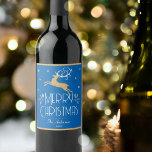 Elegant Christmas Reindeer Festive Blue Gold Wine Label<br><div class="desc">Make the holiday season extra special with a set of personalized wine labels! This elegant design features vintage-style illustrations inspired by the opulence of the Art Deco era. It includes a leaping reindeer, festive leaves and stars, paired with stylish retro typography. Customize the template with the your family surname, year,...</div>