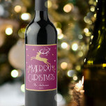 Elegant Christmas Reindeer Festive Plum Gold Wine Label<br><div class="desc">Create your own Art Deco style wine label for Christmas. An elegant template featuring a leaping reindeer, stars and decorative leaves. This editable template can be personalized with both your name and celebration year. Perfect for holiday gifts, party favours and more! Colours: pink-purple plum, white and a gold coloured texture....</div>