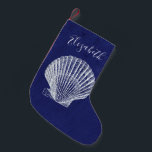 Elegant Coastal Beach Sea Shell Monogram Small Christmas Stocking<br><div class="desc">Elegant blue and white coastal cottage beach house style. White colored sea shell with monogrammed name. Blue background with half tone look.</div>