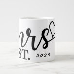 Elegant Coffee Mug for the Bride<br><div class="desc">Celebrate the groom with this elegant coffee mug featuring “Mrs." "Est. 2025” in beautiful black calligraphy and a charming heart design. The customizable year lets you mark a special wedding or anniversary, making it a meaningful and personal gift. Crafted from high-quality ceramic, this sleek mug is perfect for enjoying espresso...</div>