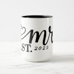 Elegant Coffee Mug in Black for the Groom<br><div class="desc">Celebrate the groom with this elegant coffee mug featuring “Mr." "Est. 20XX” in beautiful black calligraphy and a charming heart design. The customizable year lets you mark a special wedding or anniversary, making it a meaningful and personal gift. Crafted from high-quality ceramic, this sleek mug is perfect for enjoying morning...</div>