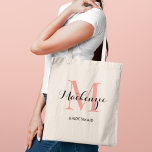 Elegant Coral Pink Custom Wedding Bridesmaid Name Tote Bag<br><div class="desc">Elegant custom wedding tote bag features a personalized monogram typography design with modern calligraphy script name and serif monogram initial in coral / salmon pink and black colours. Includes custom text for a bridal party title like "BRIDESMAID" or other preferred wording.</div>