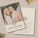 Elegant Couple's Christmas Flat Card<br><div class="desc">Embrace the spirit of the season with our Elegant Couple's Christmas Flat Card. The front showcases a refined photo adorned with a graceful snowflake design, while the back features a light background highlighting the snowflake at the top. Customize the "Merry Christmas" message and add an elegant script signature, creating a...</div>