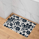 Elegant Dark Blue Floral Cream Canvas  Bath Mat<br><div class="desc">Delicate blue flowers, elegantly sprawled across the cream canvas, evoke a sense of natural beauty and grace. Each bloom is intricately detailed, showcasing the finest craftsmanship that brings the floral pattern to life. The calming cream background serves as a perfect backdrop, creating a harmonious balance that enhances the overall aesthetic....</div>