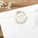 Elegant Earthy Floral Cream Wedding Favour Classic Round Sticker<br><div class="desc">This lovely favour sticker design features beautiful neutral colour florals with your names and wedding date. This timeless design is an excellent choice for many styles of events, from classic to boho. Customized favour labels make a wonderful addition to your wedding reception or bridal shower decor... and adds that extra...</div>