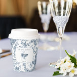 Elegant Engraved French Blue Floral Toile Paper Cups<br><div class="desc">Elegant and ornate vintage blue and white toile de jouy background pattern featuring exotic flowers,  vines and foliage intertwined with garlands and baskets of roses with custom sculpted label,  floral bouquet and text fields. Shop matching products in Collections at the Grafixmom store.</div>