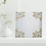 Elegant Fancy Gold Ornate Baroque Filigree Border  Tile<br><div class="desc">An exquisite decorative ceramic tile, exuding elegance through a captivating design. A sophisticated faux gold border gracefully adorns the periphery, delicately accentuated by mesmerizing turquoise gems. Set against a lustrous silver metallic backdrop, this tile exudes timeless allure, making it a perfect addition to your decor. Embrace the opulence and charm...</div>