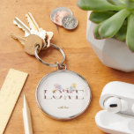 Elegant Floral LOVE Gift– Keychain<br><div class="desc">A timeless round keychain featuring the word "LOVE" beautifully framed by soft watercolor wildflowers in pastel pinks, yellows, and blues, with the heartfelt message "To the dearest person to my heart" and "with love". The textured background adds a luxurious touch. Perfect for anniversaries, Valentine's Day, birthdays, or as a sophisticated...</div>