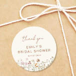 Elegant Floral Wildflower Thank You Bridal Shower Classic Round Sticker<br><div class="desc">Express gratitude with our Wildflower Thank You Bridal Shower In Bloom Classic Round Sticker. These charming stickers feature a delightful wildflower design, infusing a touch of natural beauty into your bridal shower thank-you notes or favours. The classic round shape adds versatility, making them perfect for various uses, from sealing envelopes...</div>
