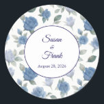 Elegant French Blue Rose Watercolor Wedding Classic Round Sticker<br><div class="desc">Add a sophisticated finishing touch to your save the date envelopes, wedding favors, or treat bags with this elegant round sticker. Featuring a stunning watercolor pattern of French blue roses and delicate greenery from our collection, this sticker perfectly seals your stationery suite with fine art style. The central white circle...</div>