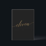Elegant Gold & Black Table Eleven Table Number<br><div class="desc">This elegant gold and black table eleven table number is perfect for a simple wedding. The neutral design features a minimalist card decorated with romantic and whimsical faux gold foil typography. The card prints on the front and back (double-sided). Other table numbers in the collection are sold separately. Please Note:...</div>