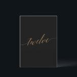 Elegant Gold & Black Table Twelve Table Number<br><div class="desc">This elegant gold and black table twelve table number is perfect for a simple wedding. The neutral design features a minimalist card decorated with romantic and whimsical faux gold foil typography. The card prints on the front and back (double-sided). Other table numbers in the collection are sold separately. Please Note:...</div>