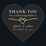 Elegant Gold Black Wedding Thank You Heart Sticker<br><div class="desc">Thank your guests with heartfelt elegance using this gold and black wedding thank you heart sticker. Featuring a romantic gold rope heart, classic black background, and modern calligraphy, this stylish sticker is perfect for sealing favour bags, gift boxes, or thank-you notes. Personalize it with your names and wedding date for...</div>