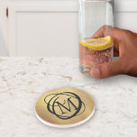 Elegant Gold Brushed Metal Monogram Stylish Coaster<br><div class="desc">Elegant,  unique monogrammed coaster in black and faux gold brushed metal. ASSISTANCE:  For help with design modification or personalization,  colour change,  transferring the design to another product or if you would like coordinating items,  contact the designer BEFORE ORDERING via the Zazzle Chat MESSAGE tab or email at makeitaboutyoustore@gmail.com.</div>