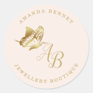 Elegant gold butterfly on beige, monogramed classic round sticker