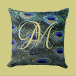 Elegant Gold Monogram Colourful Peacock Feathers Throw Pillow<br><div class="desc">Elevate your style with our luxurious Peacock Feathers throw pillow design featuring your stunning gold monogram. This exquisite design blends the vibrant beauty of colourful peacock feathers with the timeless elegance of a personalized gold letter, creating a truly unique statement for your home decor that is perfect for adding a...</div>