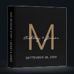 Elegant Gold Monogram Script Black Wedding Planner Binder<br><div class="desc">Chic wedding album or planner with your stylish monogram initial in gold and your names in white elegant handwritten script calligraphy on a black background. Simply add your names, monogram and wedding date. A beautiful wedding keepsake gift album for all your wedding photos and memories. Exclusively designed for you by...</div>