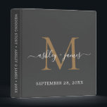 Elegant Gold Monogram Script Dark Grey Wedding Binder<br><div class="desc">Chic wedding album with your stylish monogram initial in gold and your names in white elegant handwritten script calligraphy on a dark grey background. Simply add your names, monogram and wedding date. A beautiful wedding keepsake gift album for all your wedding photos and memories. Exclusively designed for you by Happy...</div>