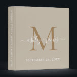 Elegant Gold Monogram Script Grey Wedding Binder<br><div class="desc">Chic wedding album with your stylish monogram initial in gold and your names in white elegant handwritten script calligraphy on a shiitake grey background. Simply add your names, monogram and wedding date. A beautiful wedding keepsake gift album for all your wedding photos and memories. Exclusively designed for you by Happy...</div>