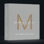 Elegant Gold Monogram Script Grey Wedding Planner Binder<br><div class="desc">Chic wedding album or planner with your stylish monogram initial in gold and your names in white elegant handwritten script calligraphy on a silver grey background. Simply add your names, monogram and wedding date. A beautiful wedding keepsake gift album for all your wedding photos and memories. Exclusively designed for you...</div>