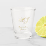 Elegant Gold Monogram Script Wedding Favour Shot Glass<br><div class="desc">These custom monogrammed wedding favour shot glasses feature an elegant faux gold calligraphy script for your monogrammed initials,  names,  and wedding date to personalize. Best of wishes for your wedding and marriage! Designed by Susan Coffey.</div>