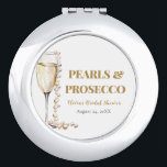 Elegant Gold Pearls and Prosecco Bridal Shower Compact Mirror<br><div class="desc">The "Elegant Gold Pearls and Prosecco Bridal Shower Compact Mirror" is a sophisticated accessory that adds a touch of elegance to any bridal celebration. Adorned with intricate designs inspired by gold pearls and the effervescence of Prosecco, this compact mirror is both stylish and practical. Perfect for quick touch-ups on the...</div>