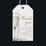 Elegant Gold Pearls and Prosecco Bridal Shower Gift Tags<br><div class="desc">Elevate your bridal shower gifts with our Elegant Gold Modern Pearls and Prosecco Gift Tags. Crafted with sophistication in mind, these tags add a touch of glamour to any present. Featuring a sleek design accented with pearls and a hint of bubbly prosecco, they perfectly complement your upscale event. Make your...</div>