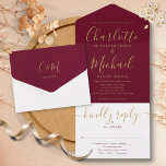 Elegant Gold Script Minimalist Burgundy Wedding All In One Invitation<br><div class="desc">All in one wedding invitation featuring elegant gold signature script name and monogram initials on a burgundy background. The invitation includes a perforated RSVP card that’s can be individually addressed or left blank for you to handwrite your guest's address details. Designed by Thisisnotme©</div>