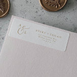 Elegant Gold Script Monogram Return Address Label<br><div class="desc">These elegant gold script monogram return address labels are perfect for a simple wedding. The minimalist gold and white design features fancy romantic typography with modern glam style. Customizable in any colour. Keep the design minimal and classy, as is, or personalize it by adding your own graphics and artwork. These...</div>