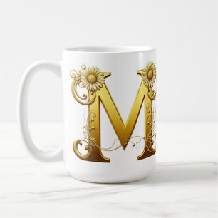 Elegant Golden Letter M With Floral Embellishments Coffee Mug