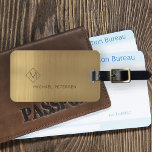Elegant golden monogrammed name modern luggage tag<br><div class="desc">Modern luxury exclusive looking luggage tag on a faux metallic brushed gold background with geometric diamond shaped monogram. Personalize it with your name,  monogram,  and details on both sides!</div>