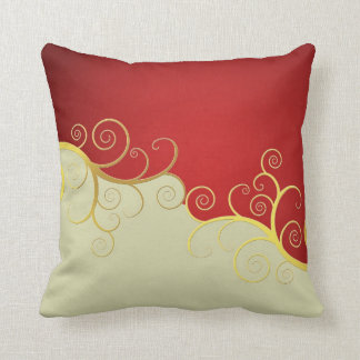 Elegant golden swirls on red and cream throw pillow
