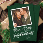 Elegant Green Holly Jolly Christmas Script Photo Holiday Card<br><div class="desc">This lovely holiday photo card features a white calligraphy script greeting that says "Have a Holly Jolly Christmas" over a deep green background with a single square photo. On the back of the card is the same green colour. Add another photo and/or additional text by clicking "design with editor tool"....</div>
