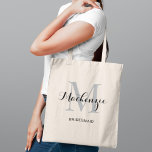 Elegant Grey Black Custom Wedding Bridesmaid Name Tote Bag<br><div class="desc">Elegant custom wedding tote bag features a personalized monogram typography design with modern calligraphy script name and serif monogram initial in silver grey and black colours. Includes custom text for a bridal party title like "BRIDESMAID" or other preferred wording.</div>