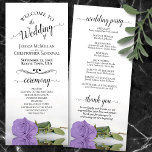 Elegant Lavender Purple Rose Romantic Wedding Program<br><div class="desc">This beautiful wedding program features an elegant design with a single long stemmed light purple or lavender coloured rose lying on its side reflecting in water. The titles are written in fancy script calligraphy, and there is space for your ceremony and wedding party details, as well as a short thank...</div>