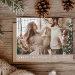 Elegant Merry Christmas Neutral Photo  Postcard<br><div class="desc">Celebrate the holiday season with this beautifully minimalistic Merry Christmas photo card in neutral tones. Perfect for adding a modern and timeless touch to your holiday greetings. Personalize with your family photo and custom name, creating a unique and elegant card that will be cherished by all your loved ones. Ideal...</div>