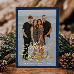 Elegant Merry Christmas Script Navy 2 Photo Foil Holiday Card<br><div class="desc">Introducing the Elegant Merry Christmas Navy and Gold Foil Script holiday photo card, a beautifully simple and modern way to send holiday cheer. Featuring your vertical photo framed in navy, the card displays "Merry Christmas" in elegant gold foil calligraphy overlaying the image. Customize with your name and the year in...</div>