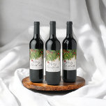 Elegant Merry Christmas Script Rustic Wood Wine Label<br><div class="desc">Elegant Merry Christmas script on rustic wood with christmas tree branches and ornaments.</div>