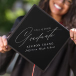 Elegant Minimalist Black and White Graduation Cap Topper<br><div class="desc">Elegant graduation cap topper featuring "Graduate" displayed in a beautiful white calligraphy script with a black background. Personalize the graduation cap topper with the graduate's name,  school name,  and graduation year.</div>