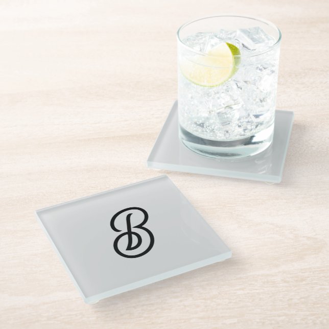 Elegant minimalist modern initial on grey glass coaster (Angled)