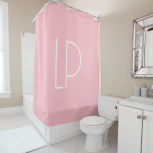 Elegant minimalist modern initial on pastel pink