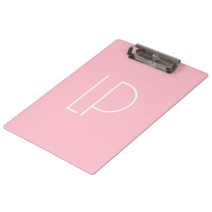 Elegant minimalist modern initial on pastel pink clipboard