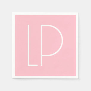 Elegant minimalist modern initial on pastel pink napkin