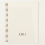 Elegant Minimalist Monogram Ivory Spiral Notebook Planner<br><div class="desc">Your bridesmaids have been by your side through every laugh, late-night planning session, and “are we really doing this?” moment. This personalized bridesmaid gift is both thoughtful and practical—a minimalist monogram notebook they’ll actually use. The elegant ivory cover with clean grey initials gives it a timeless style, while the sturdy...</div>