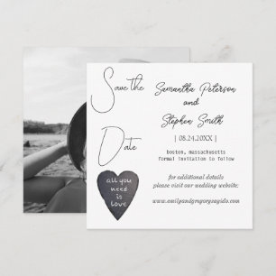 Elegant minimalist photo of black heart save the date